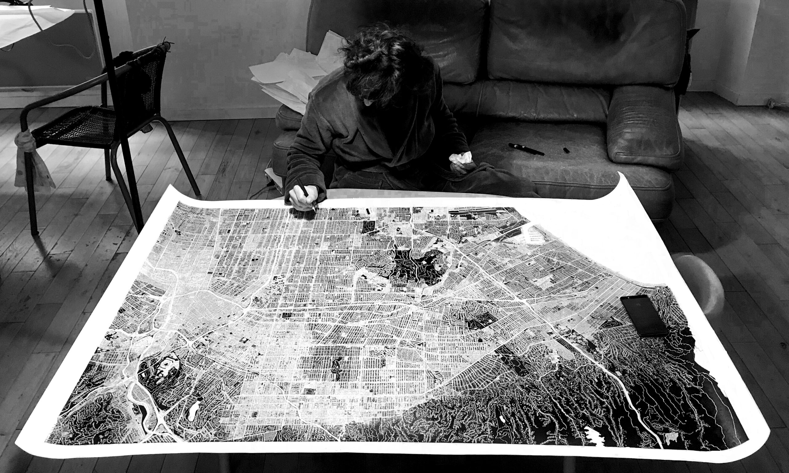 artist gridzone drawing at her desk